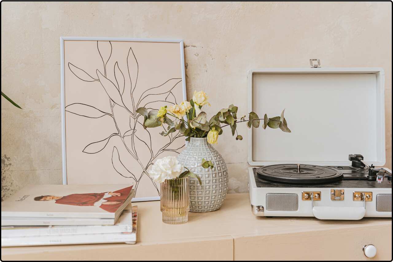 Trendy table setting featuring a decorative book and cassette, perfect for a modern home.